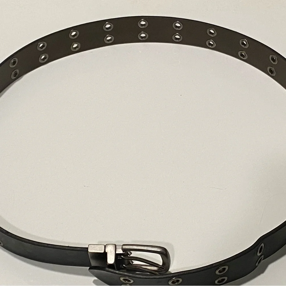 Women’s Black PU leather belt with grommets. Sz L.